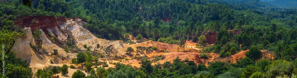 Panoramic view of abstract Rustrel canyon ocher cliffs landscape. Provencal Colorado near Roussillon