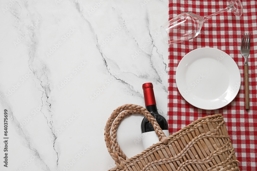 Beautiful setting for picnic on white marble background