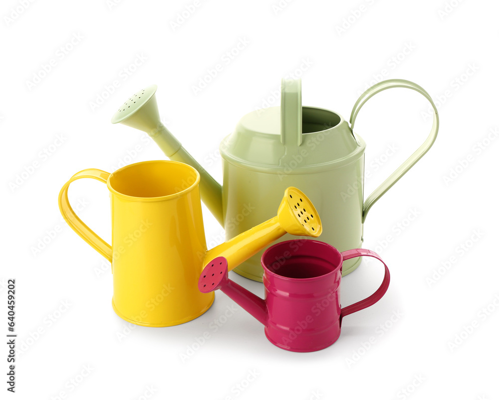 Set of watering cans on white background