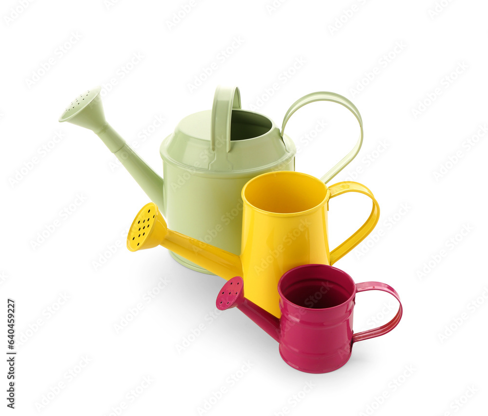 Set of watering cans on white background