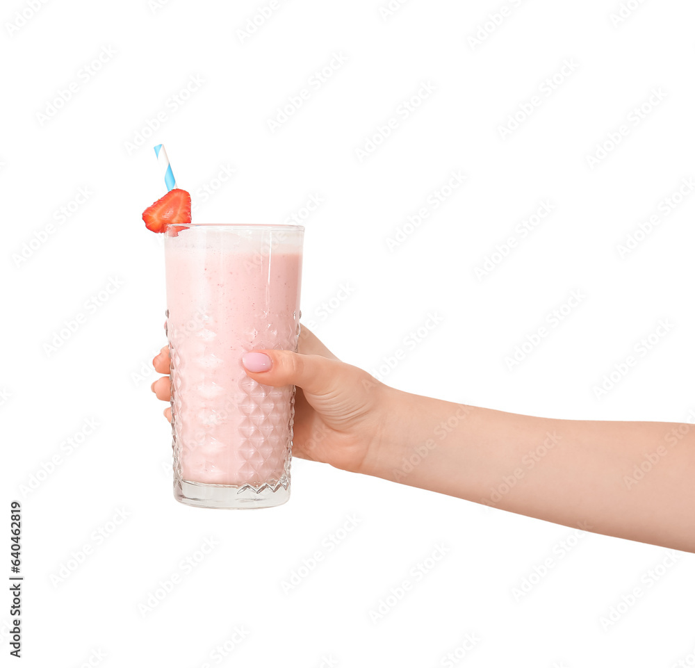 Woman holding glass of tasty strawberry smoothie on white background