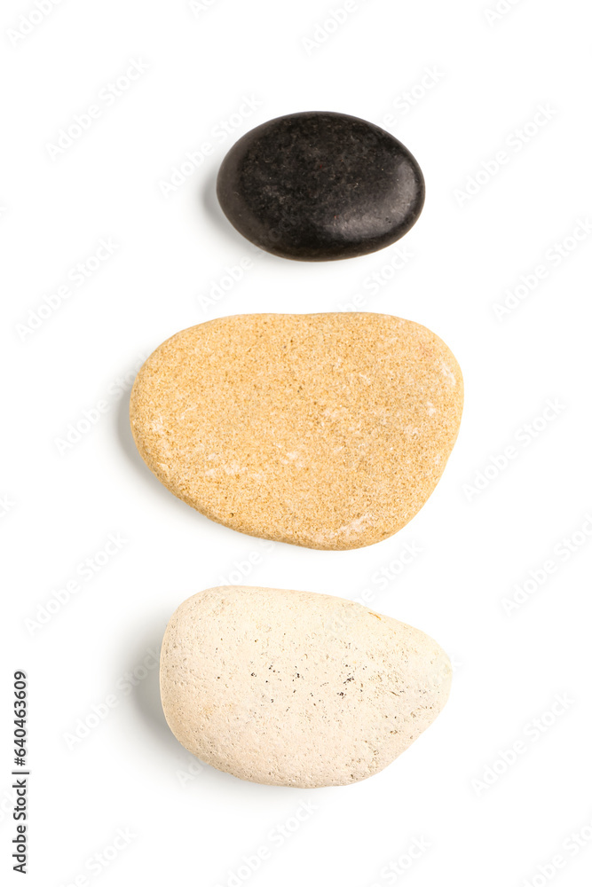 Pebble stones on white background