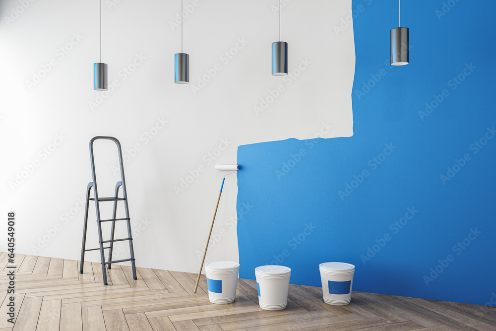 Contemporary interior with blue paint on concrete wall, painting tools, ladder, lamps and wooden flo