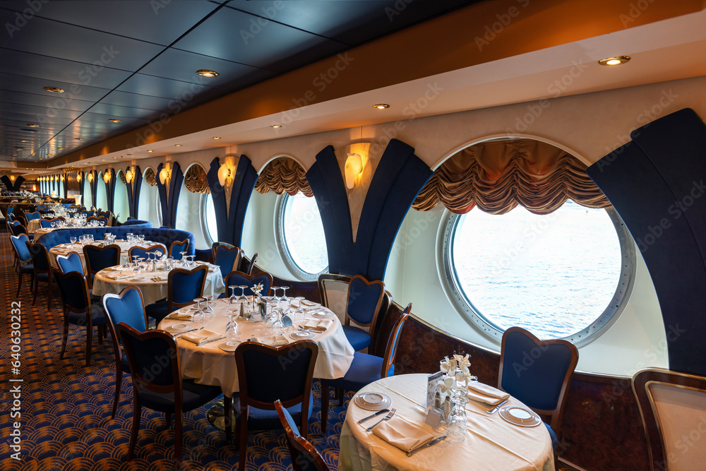 Luxury restaurant on a cruise ship that hosts dinners and entertainment events.