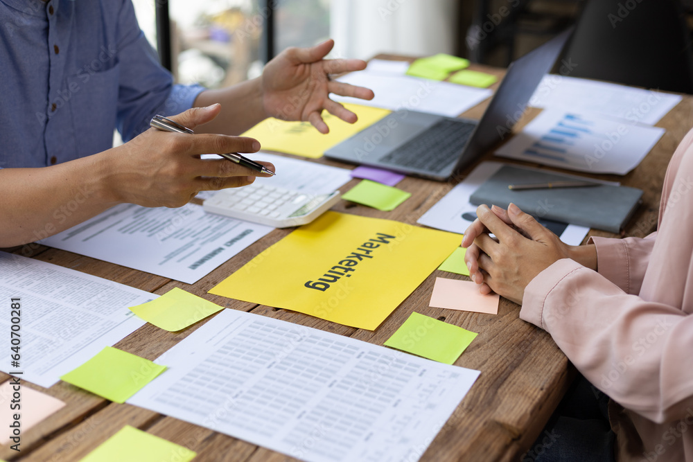 Meeting of colleagues is discussing financial statement analysis in accounting and brainstorming bus