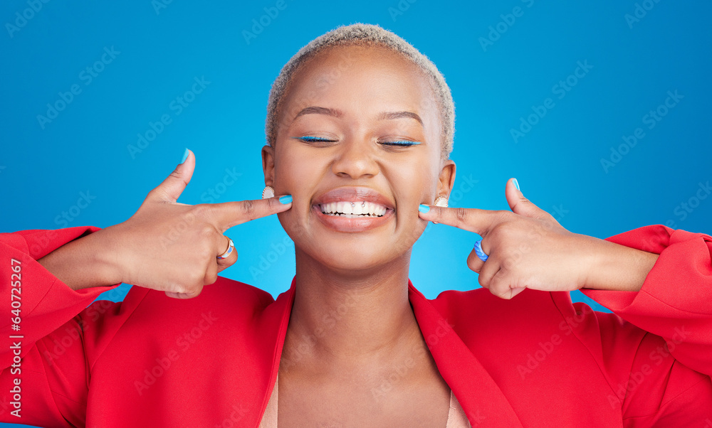 Happy, pointing and young black woman with cheek for smile in a studio with an excited or positive a