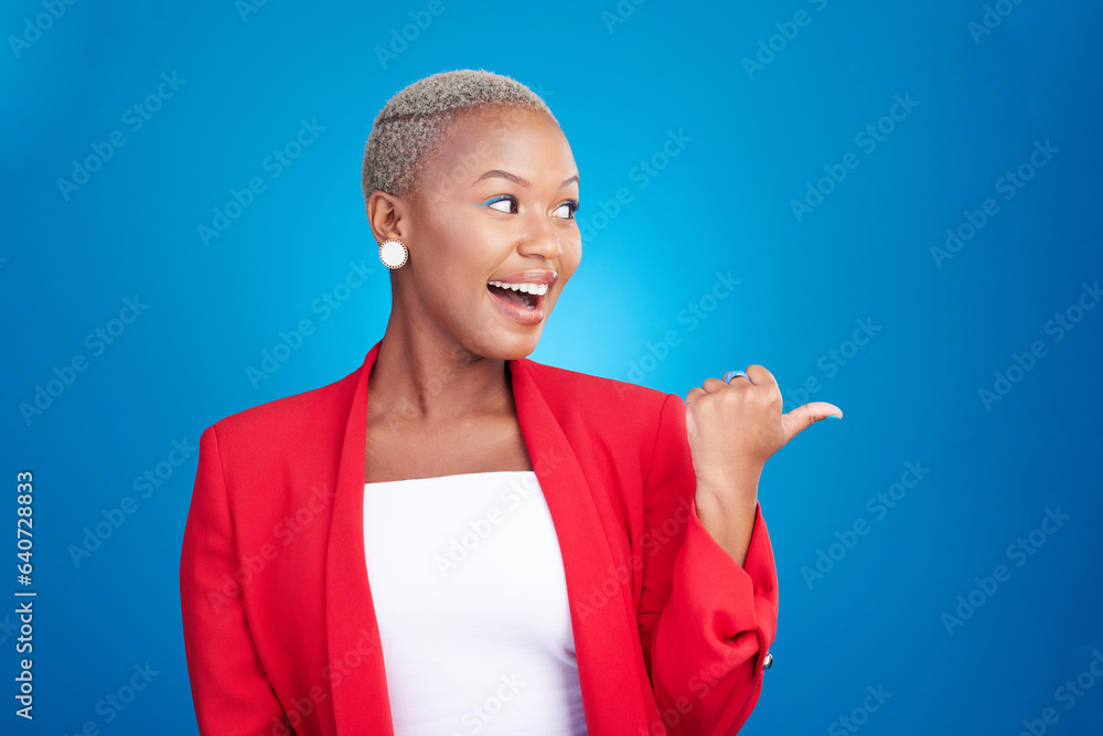 Pointing, surprise and a woman in studio with hand for advertising, marketing or announcement. Happy