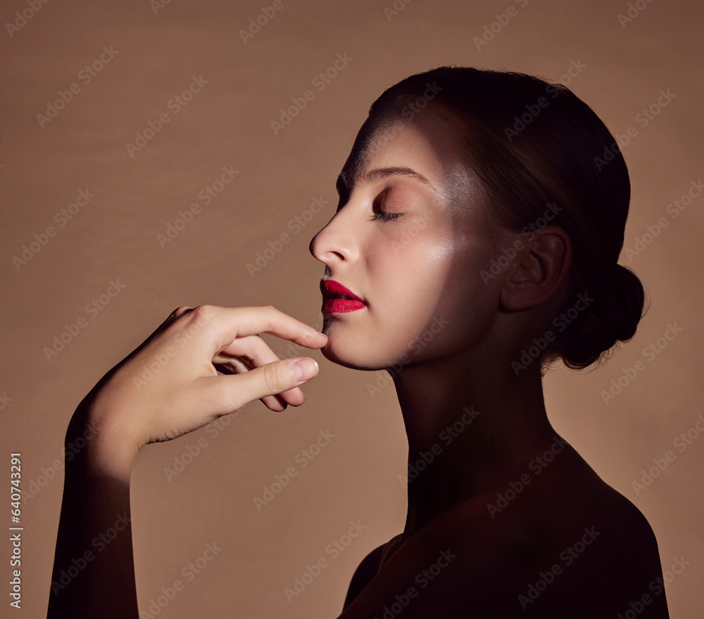 Spotlight, profile or woman in shadow with beauty and creative aesthetic in studio background. Light