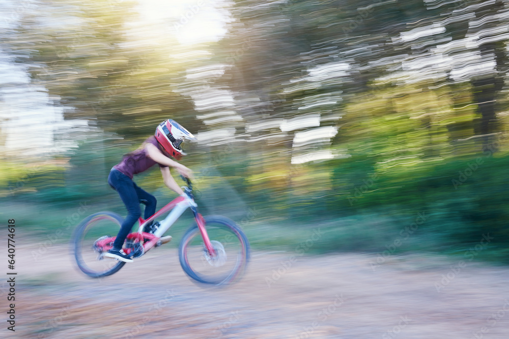 Blurred speed, sports and man cyclist on bicycle for race, competition or marathon training. Fitness