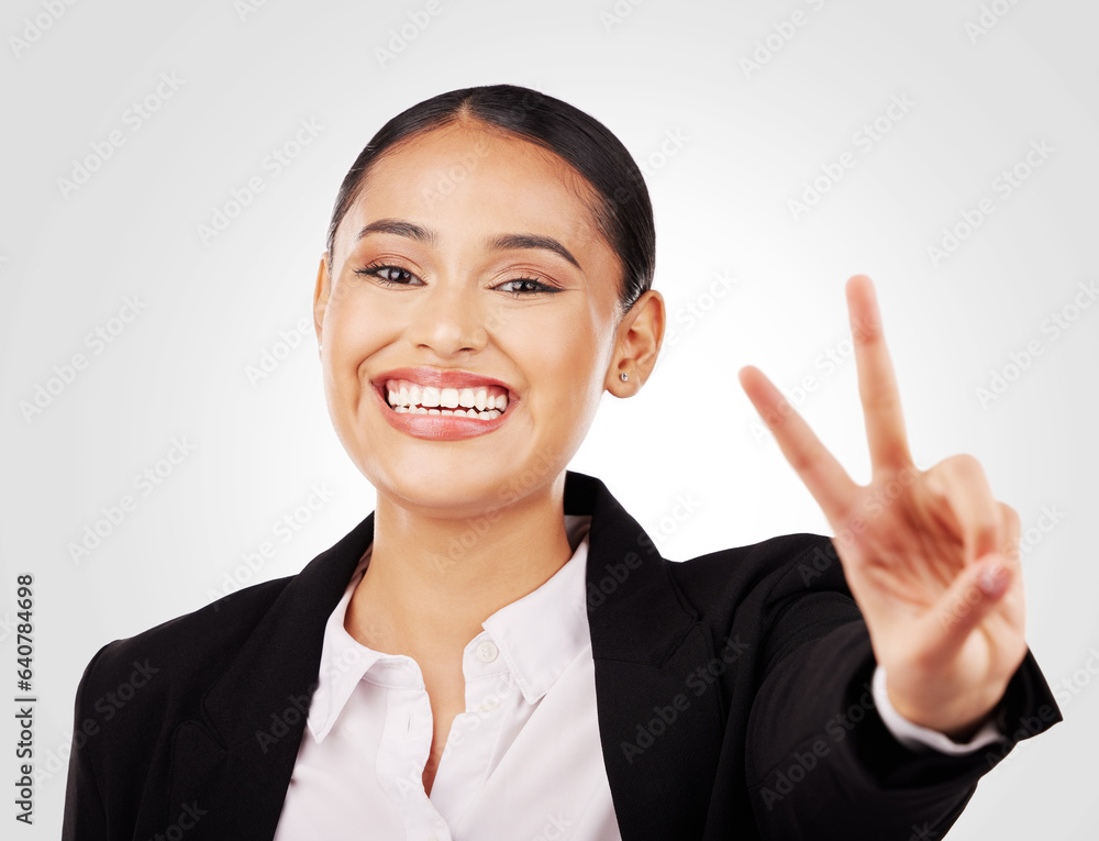 Happy business woman, portrait and peace sign in career ambition or positive mindset against a studi