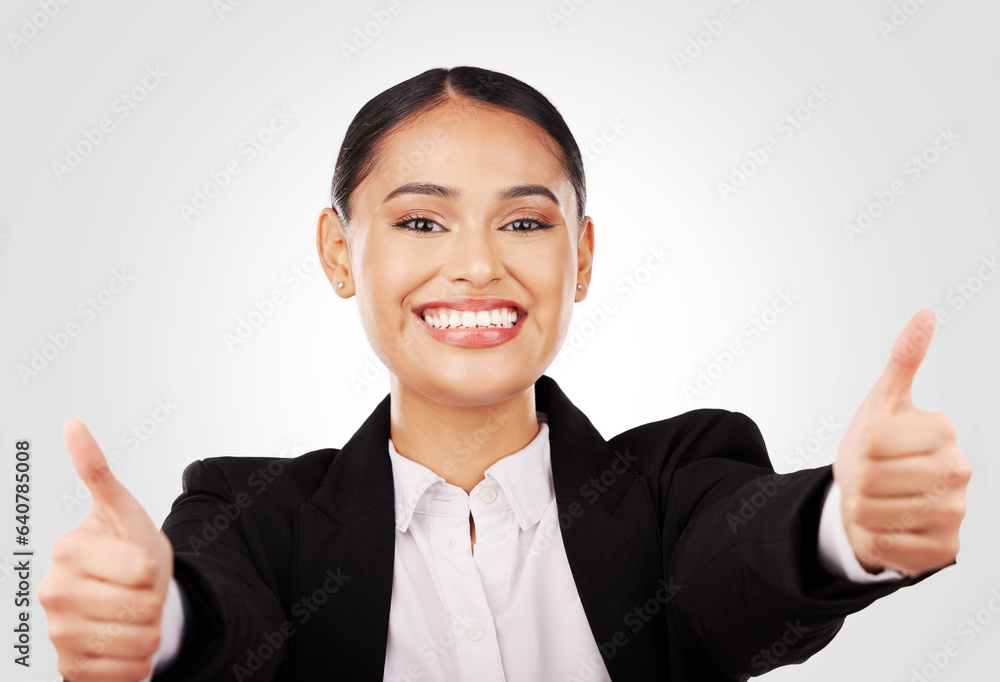 Happy woman, portrait and thumbs up in business success, winning or thank you against a studio backg