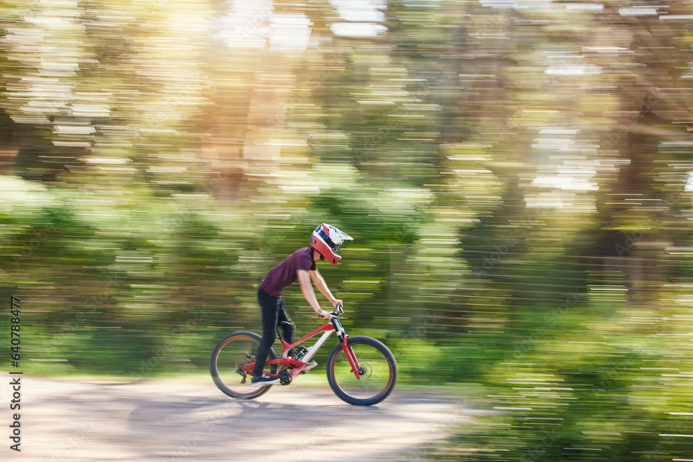 Blurred trees, sports and athlete cycling on bicycle for race, competition or marathon training. Fit