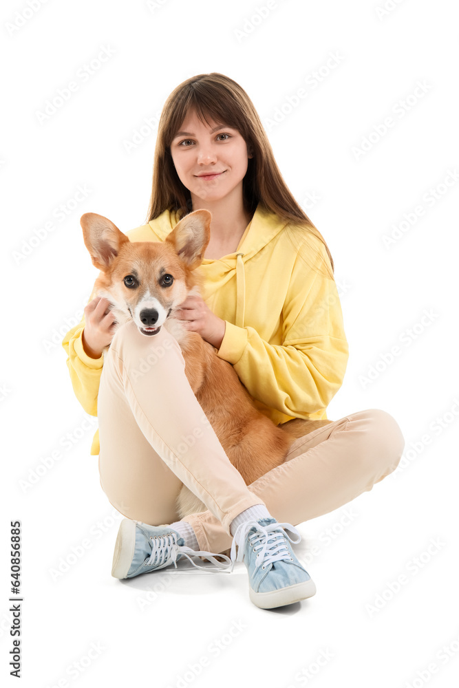 Pretty young woman with cute Corgi dog sitting on white background