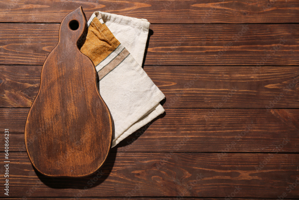 New cutting board on wooden background