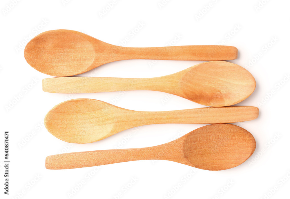 Composition with wooden spoons isolated on white background