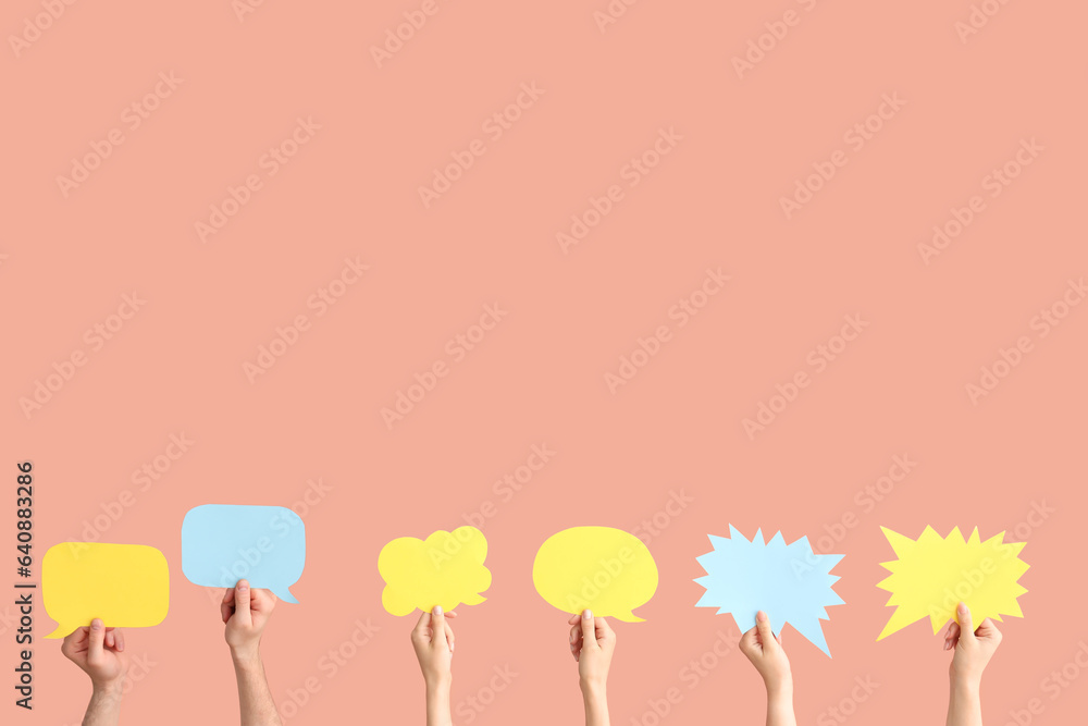 Different hands with speech bubbles on red background