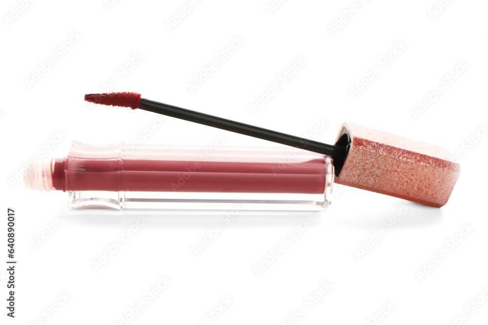 Beautiful liquid pink lipstick on white background