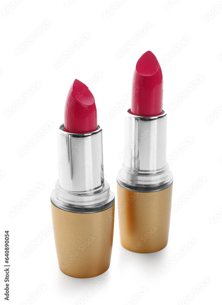 Beautiful red lipsticks on white background