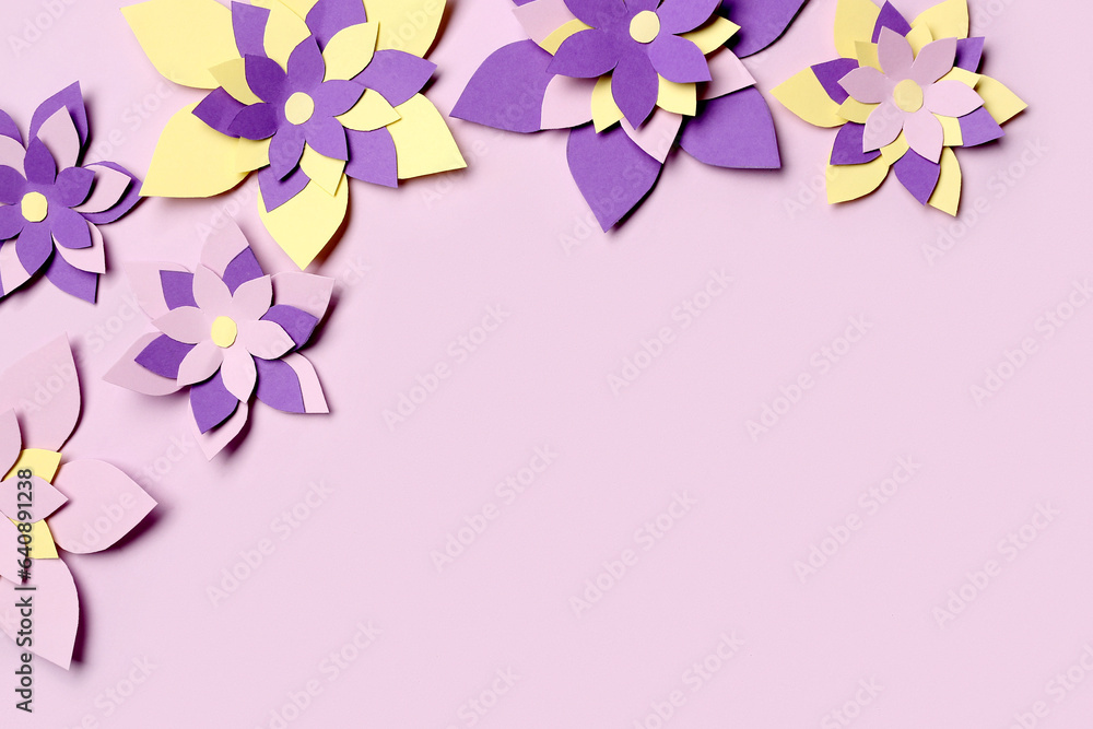 Colorful origami flowers on purple background