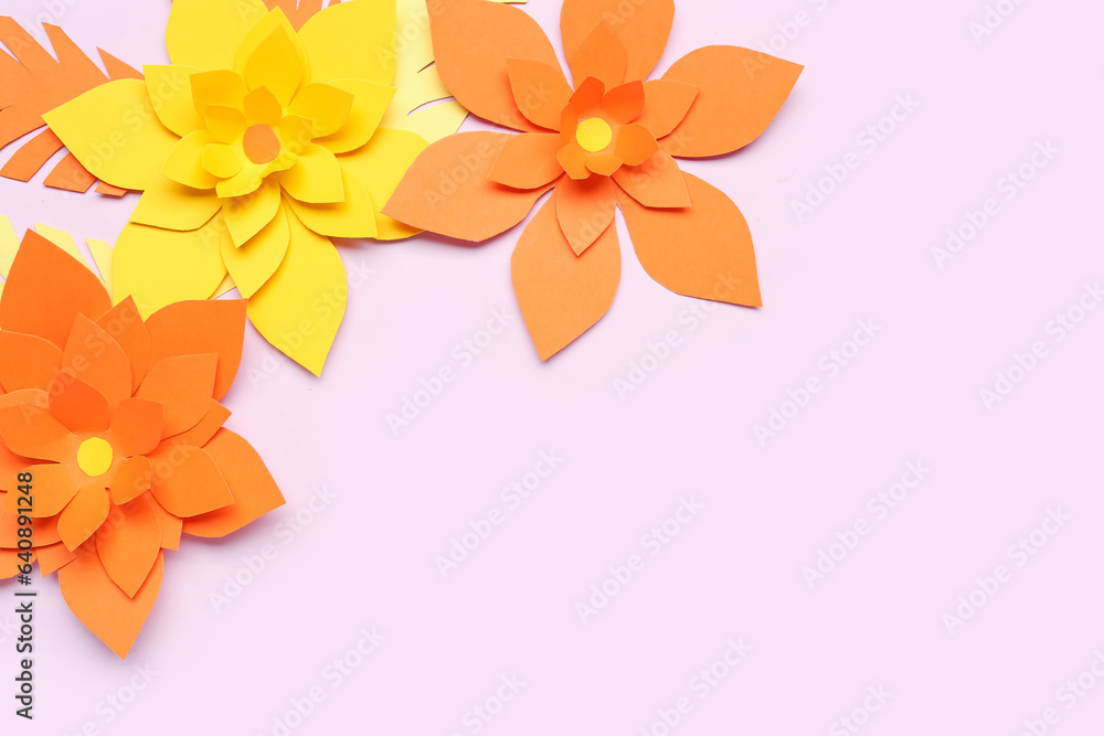 Colorful origami flowers with leaves on purple background