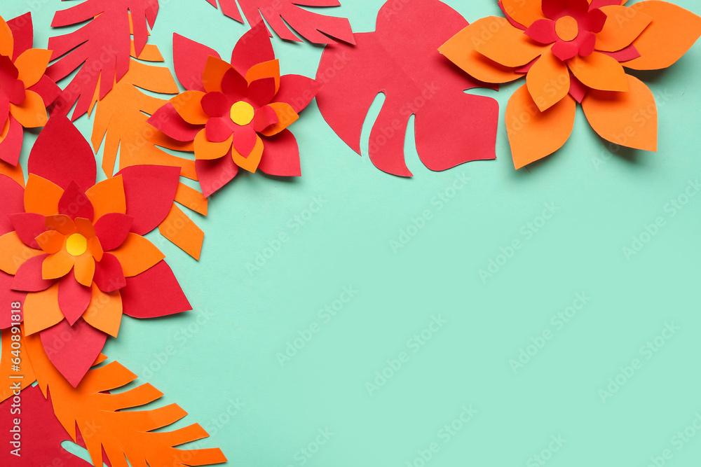 Colorful origami flowers with leaves on green background