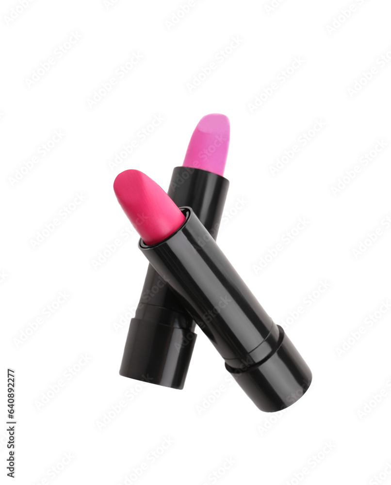 Beautiful pink lipsticks in different shades on white background