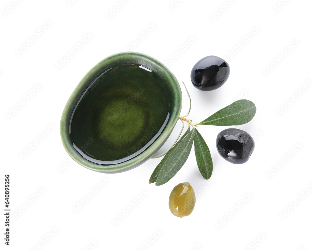 Bowl of fresh olive oil on white background