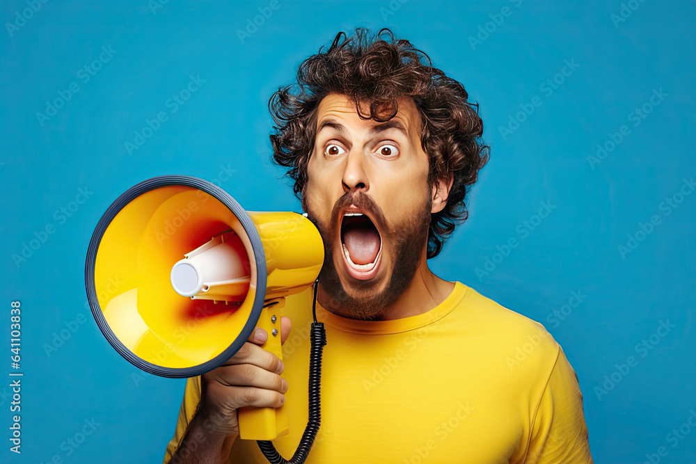 Wow face of young bearded man wears blue shirt hold scream in megaphone announces discounts sale Hur