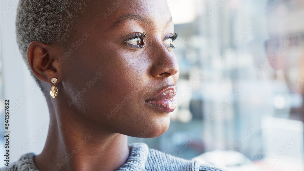 Thinking, professional and black woman by window in office with ideas, brainstorming and planning. C