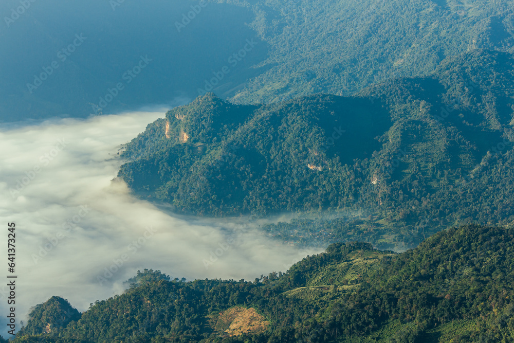 Sunrise, morning fog and the mountain