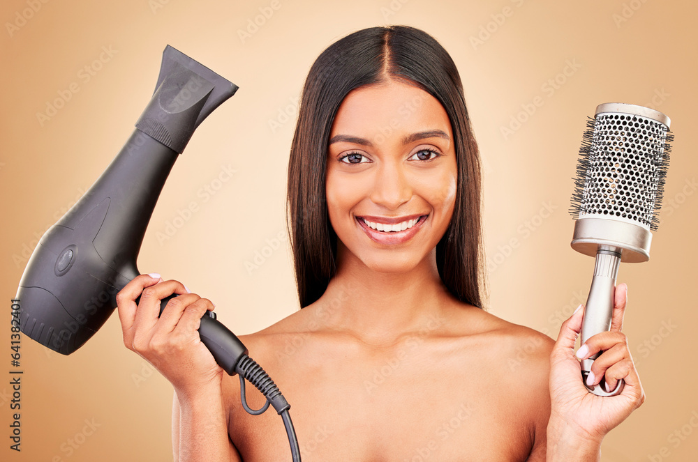 Portrait, brush and hairdryer for haircare on a studio background for styling, grooming or a salon. 