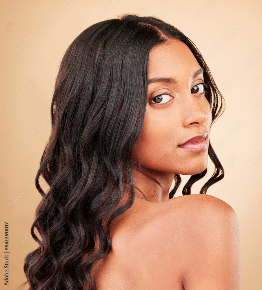 Portrait, hair care and woman with beauty, glow and luxury with grooming on a brown studio backgroun