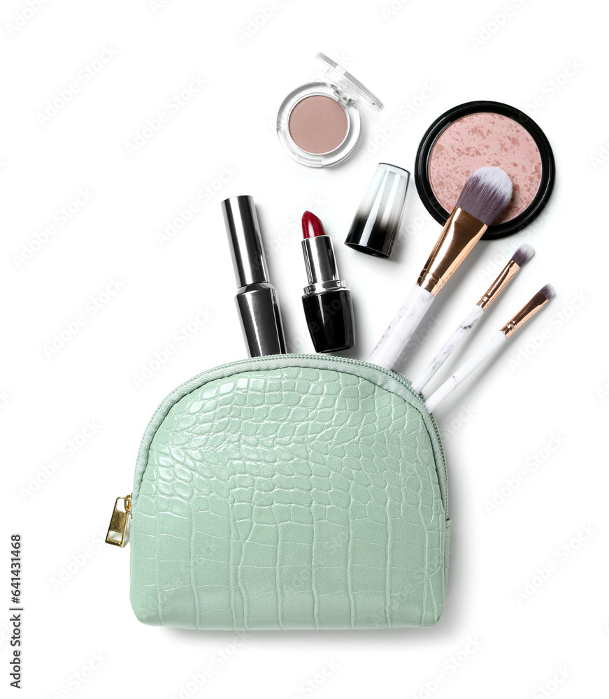 Bag with decorative cosmetics and makeup brushes on white background