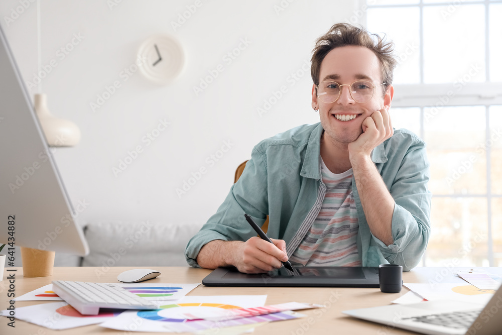 Portrait of male graphic designer in office