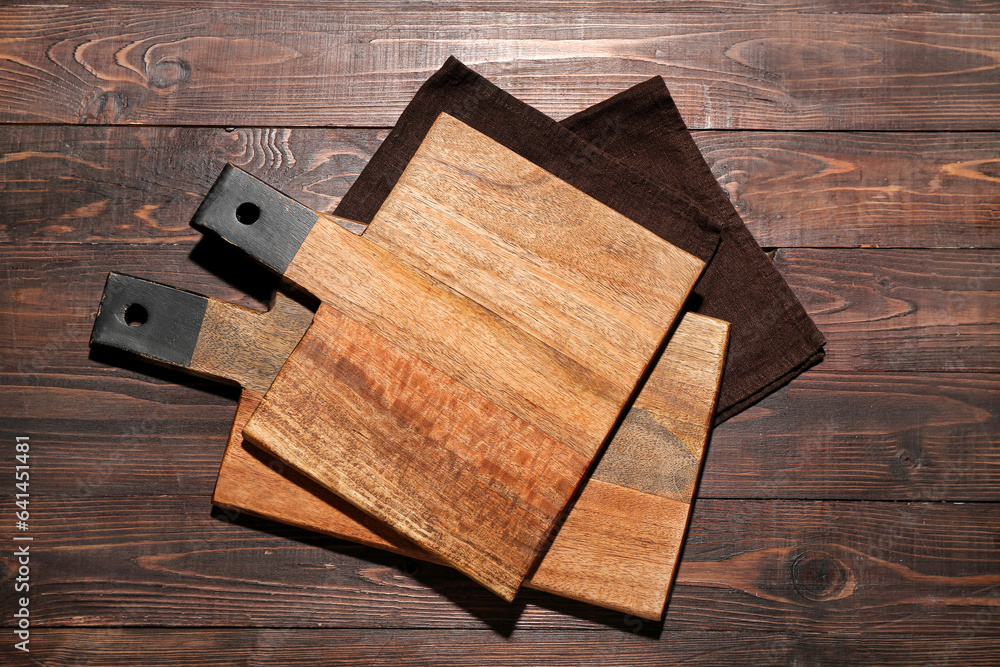 New cutting board on wooden background