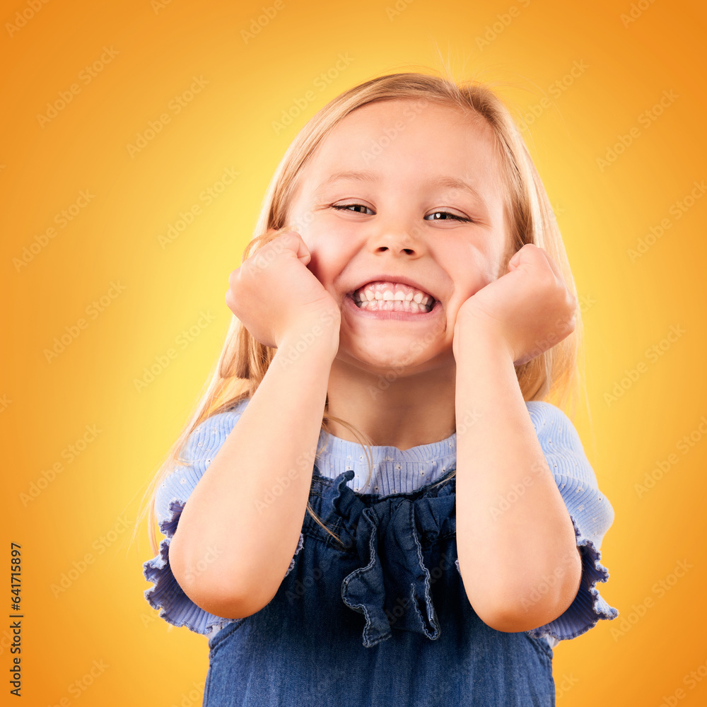 Portrait, child and girl with a smile, surprise and excited on a yellow studio background. Face, per