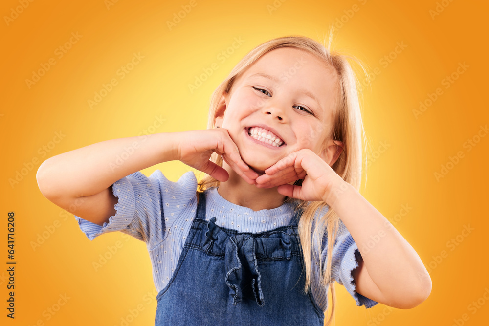 Portrait, kid and girl with surprise, wow and excited with happiness on a yellow studio background. 