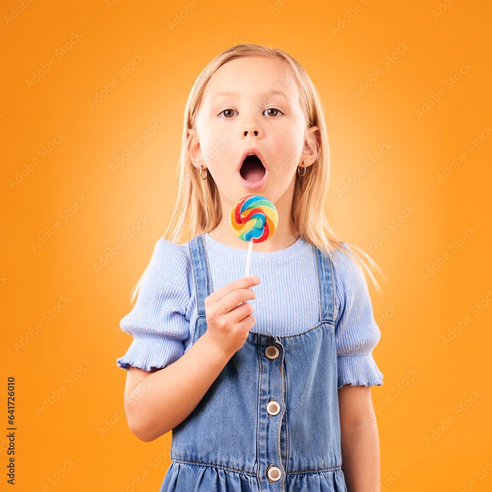 Candy, girl child and portrait of lollipop in hand, open mouth and studio for sweets, birthday party