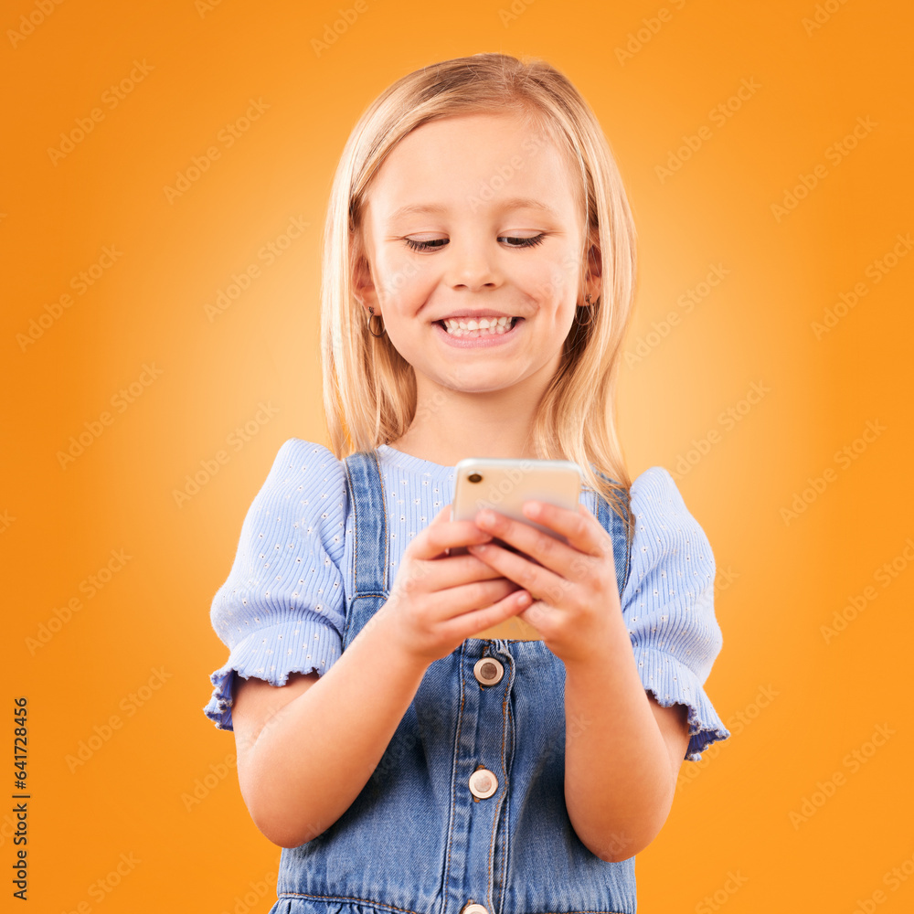 Child, smile and typing with phone in studio for social media, play mobile games and download app on