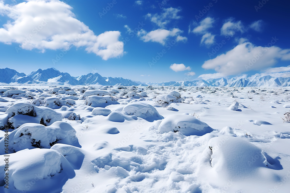 snow mountain and farm under blue sky and white clouds