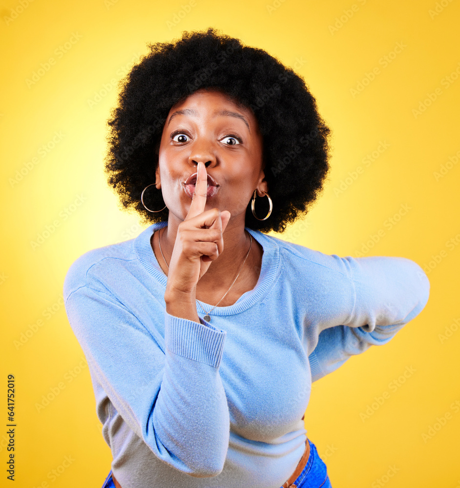 Secret, portrait and black woman with finger on lips in studio for privacy, drama and surprise on ye