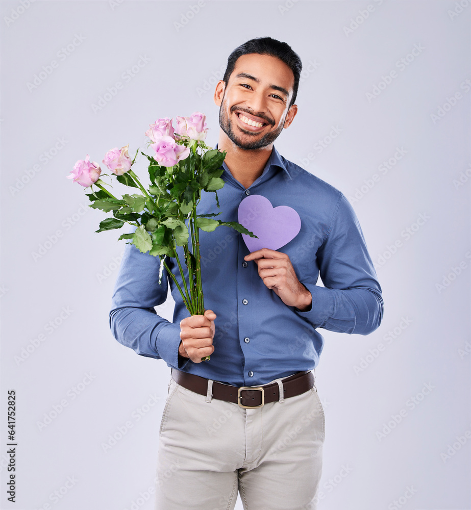 Purple heart, portrait and asian man with roses in studio for thank you, gift or care on grey backgr