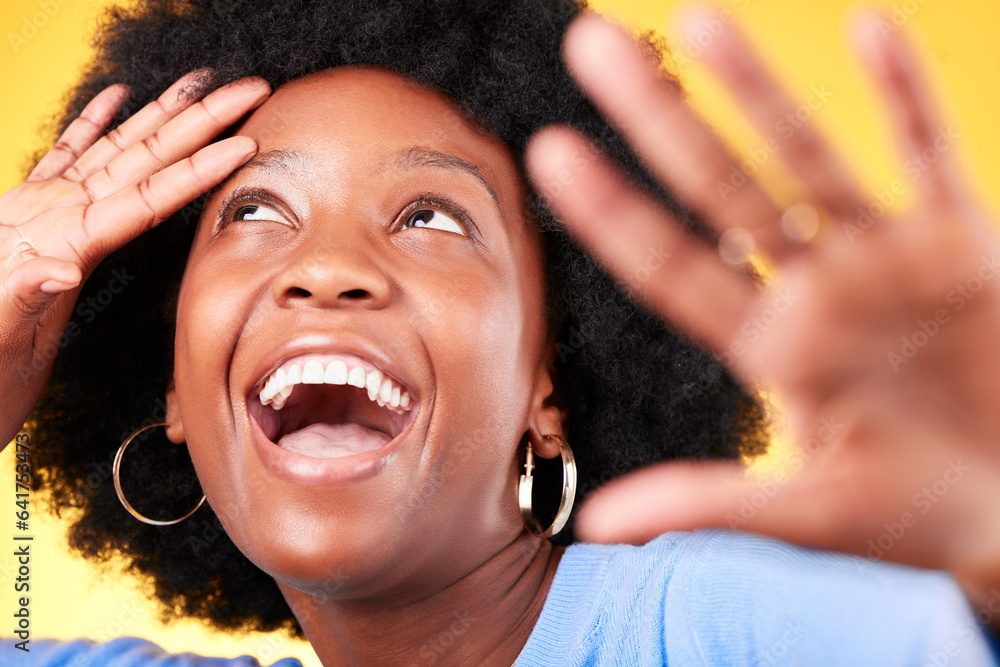 Face, happy and energy with a black woman closeup in studio on a yellow background for excitement. W