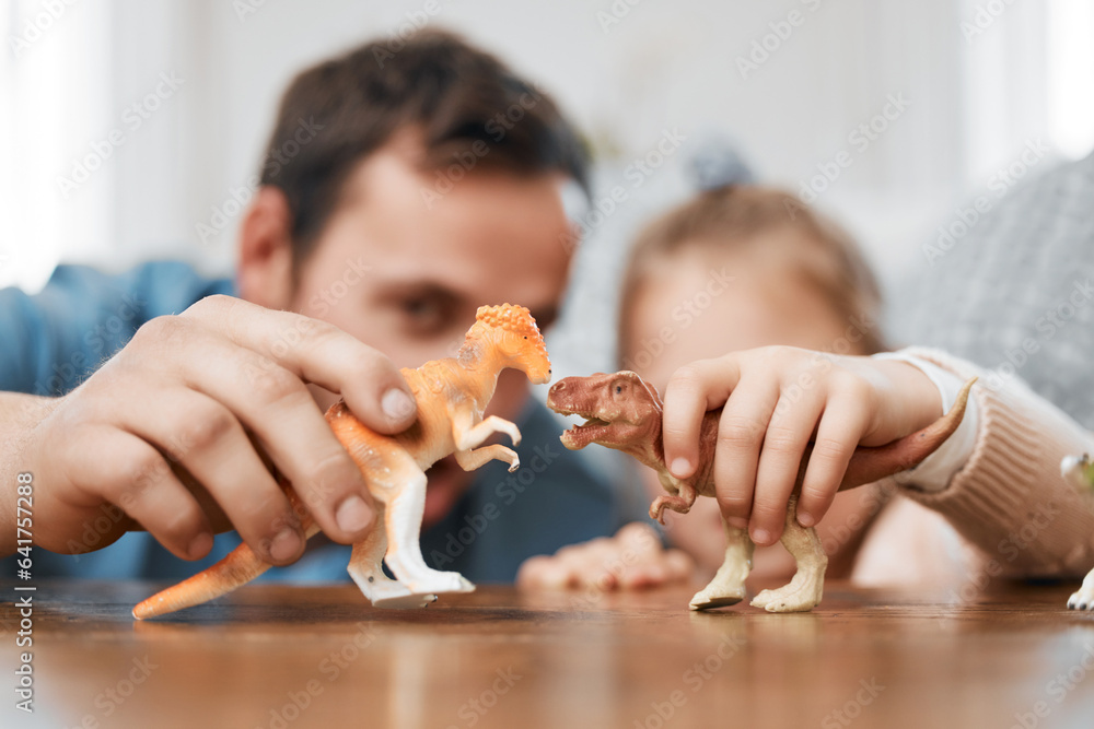 Playing, dinosaur and the hands of a father and child for bonding, childhood and on a table. Closeup