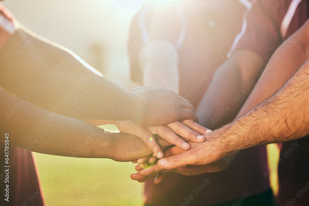 Hands, sports and a rugby team in huddle together for a game or goal of competition in a stadium clo