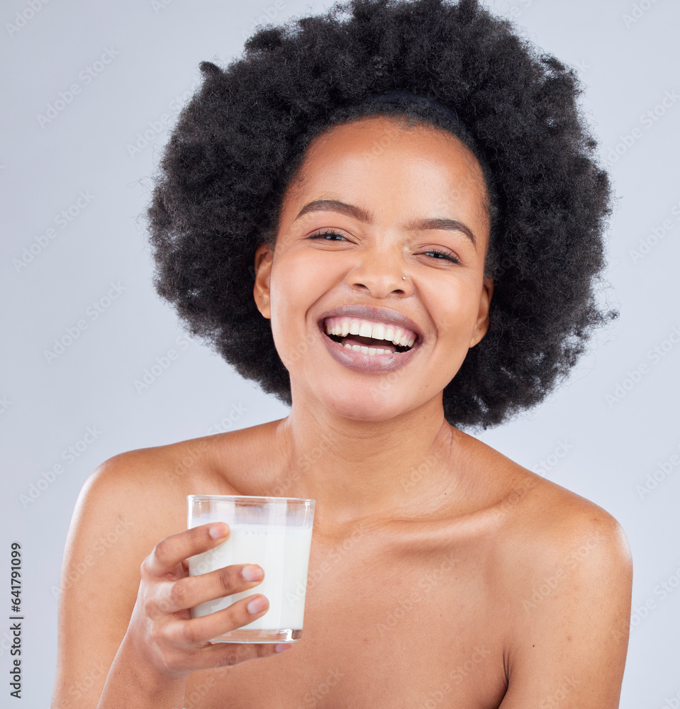 Happy woman, portrait and drink milk in studio for healthy skin, diet and calcium on white backgroun