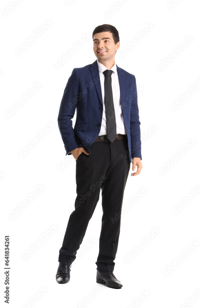 Young businessman on white background