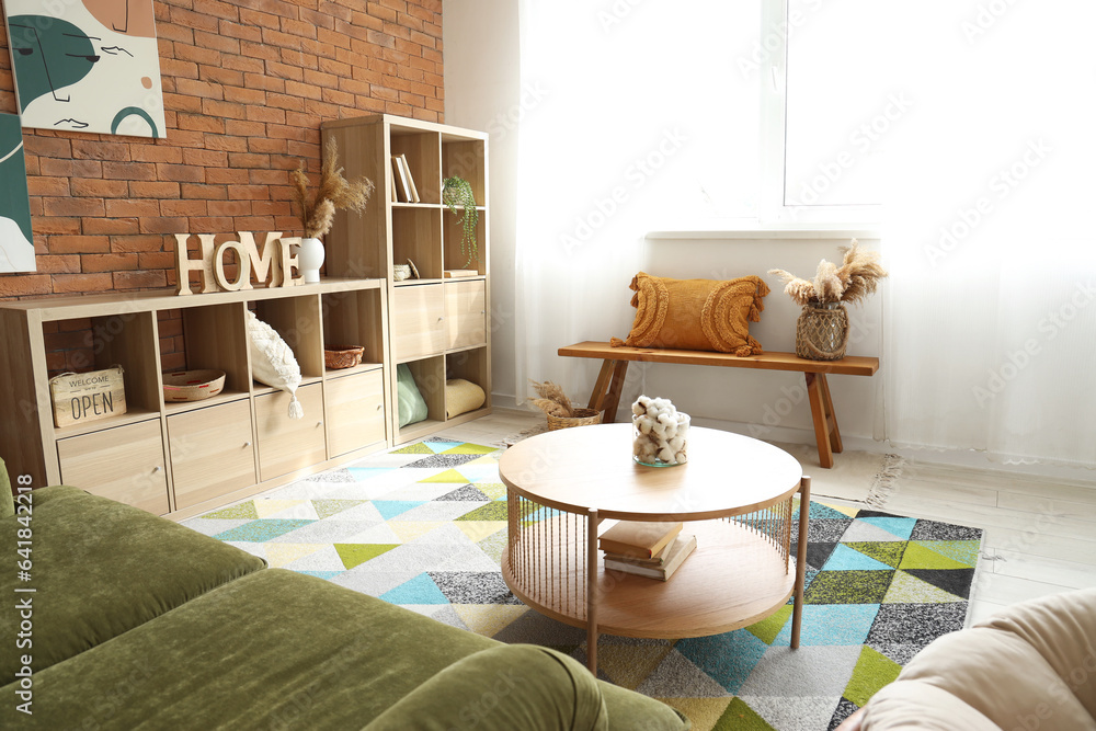 Interior of living room with wooden bench and shelving unit