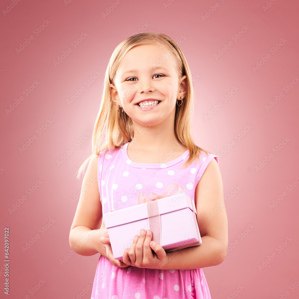 Child, gift or present portrait in studio for birthday, holiday or happy celebration. Excited girl k