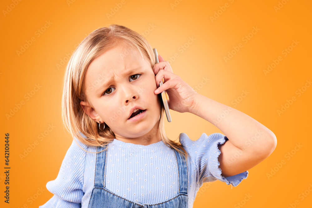 Portrait, phone and a confused girl on an orange background in studio for a communication question. 